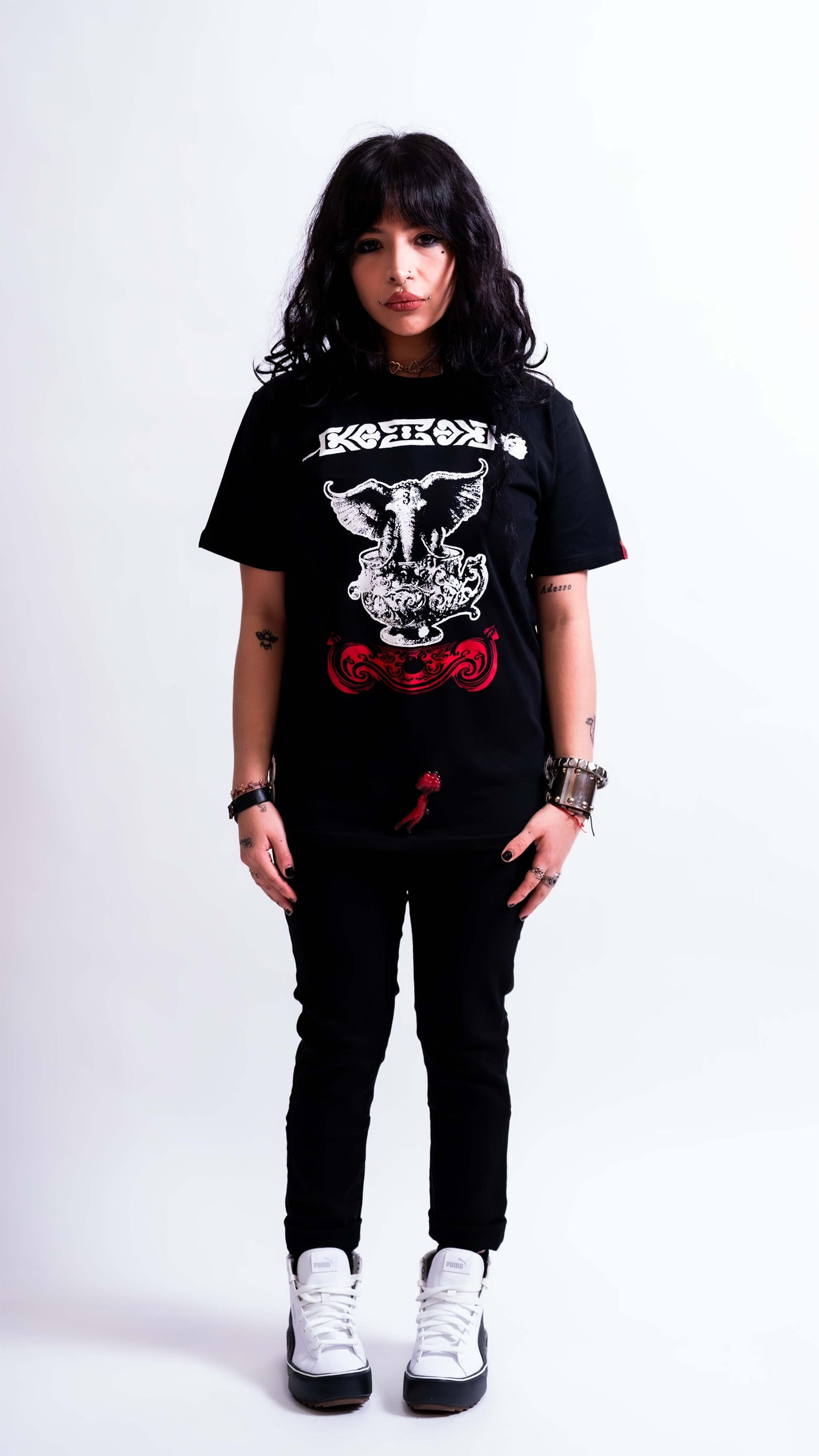 Luxury DRIFT3R black tee with graphic amulet detail